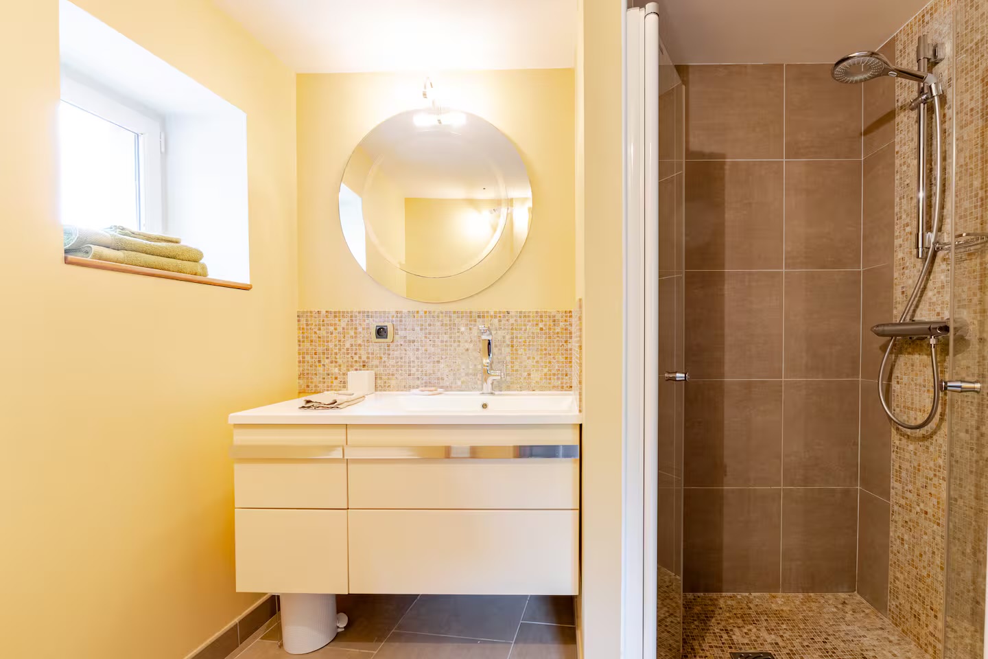 The bathroom of the duplex suite, walk-in shower