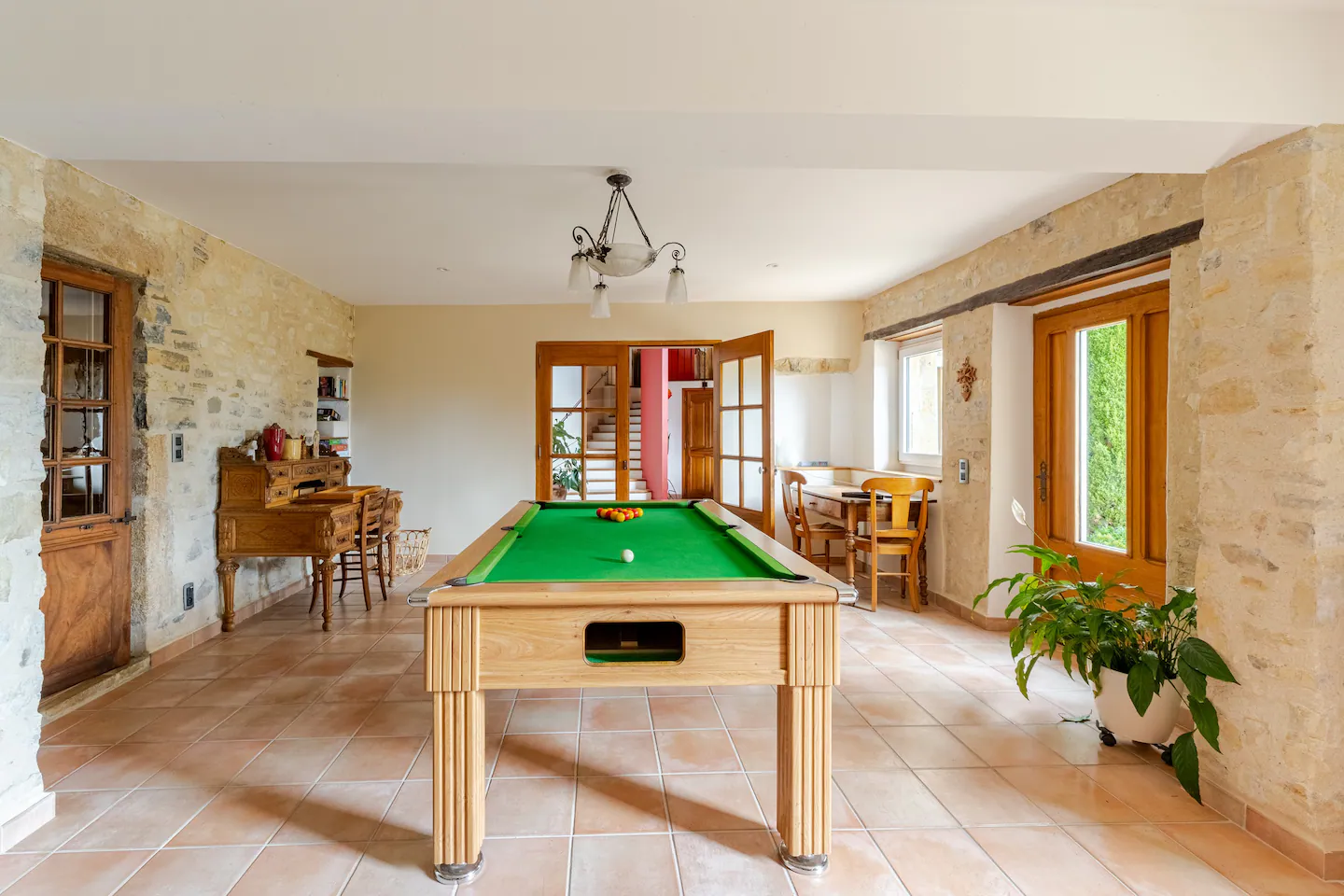 Games room with a billiards table